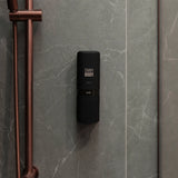 one black ONNYBODY dispenser attached to a tiled bathroom wall.